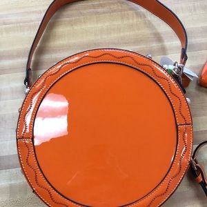 Vegan round orange purse with faux pearls